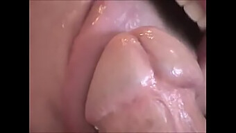 Intense Close-Up Of Oral Pleasure On A Big Cock