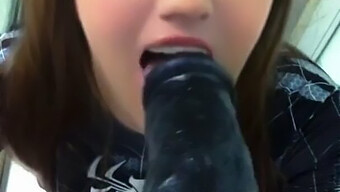 A Young Girl'S Attempt To Swallow A Large Black Sex Toy